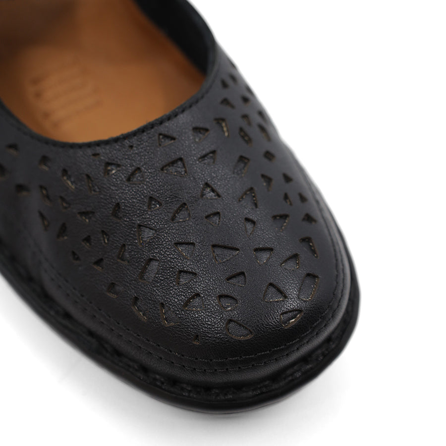 top view of shoe metallic leather laser cut detail