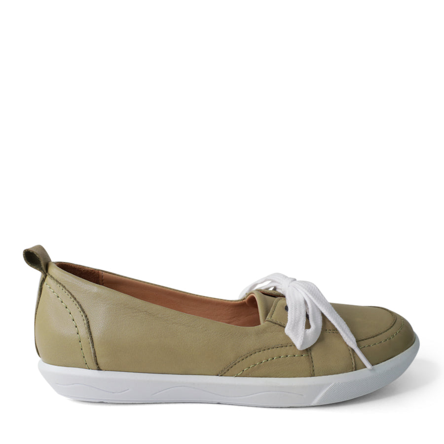 SIDE VIEW OF GREEN CASUAL SHOE WITH LACES AT THE FRONT AND WHITE SOLE 