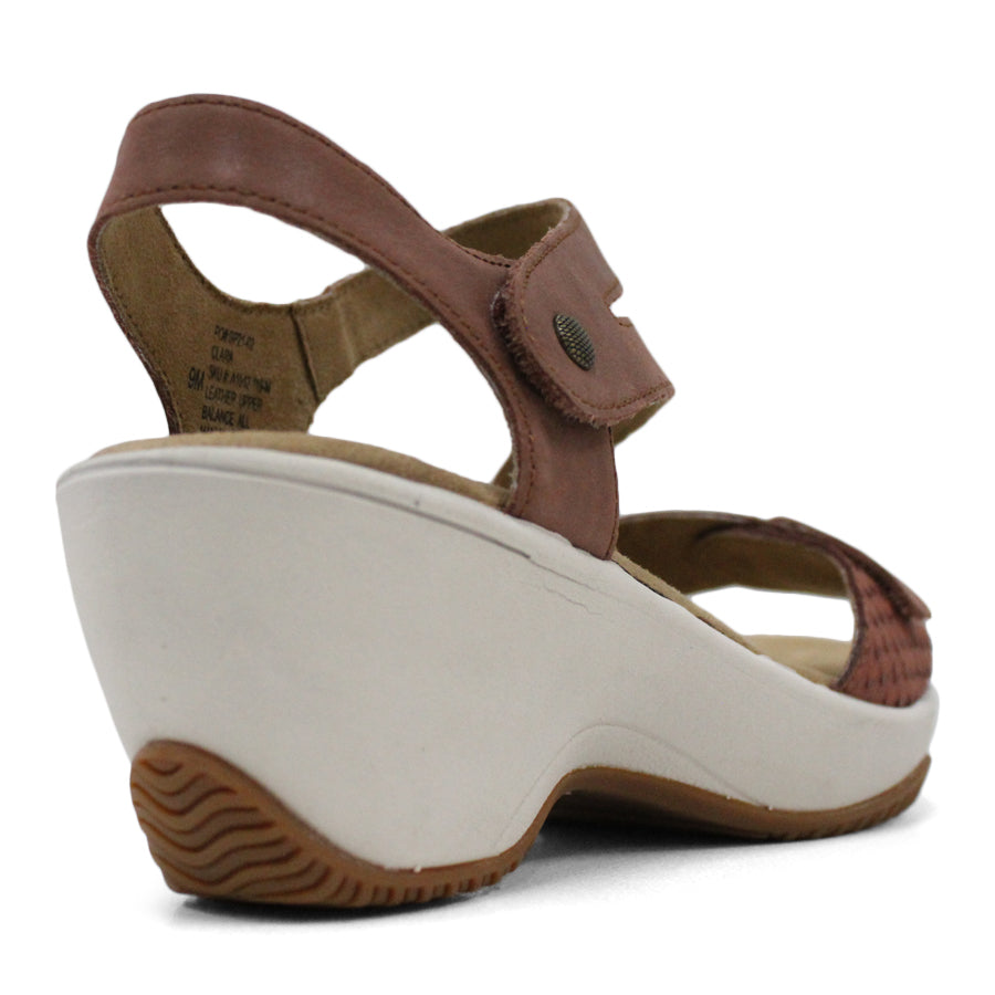 BACK VIEW OF BROWN MID HEEL WITH Y BACK STRAP, WHITE SOLE 