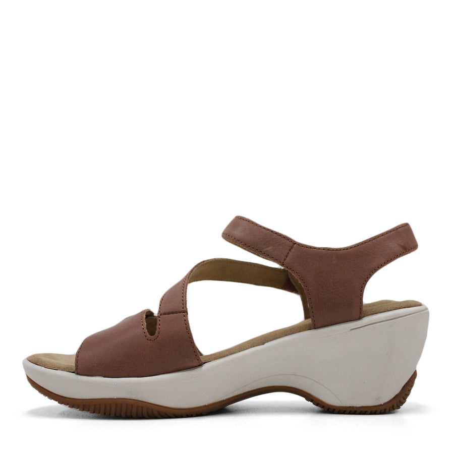 SIDE VIEW OF BROWN MID HEEL WITH Y BACK STRAP, WHITE SOLE 
