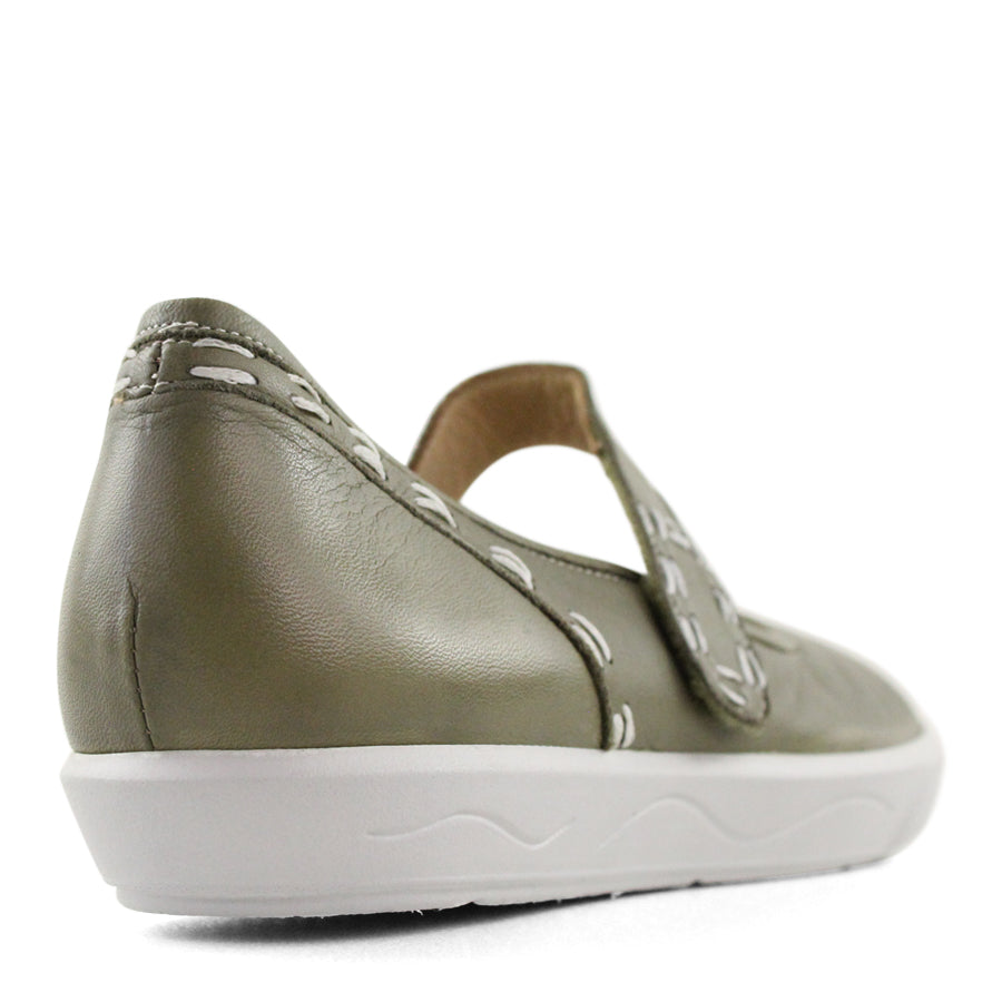BACK VIEW OF GREEN CASUAL SHOE WITH MARY JANE STYLE STRAP ACROSS THE TOP AND WHITE STITCH DETAIL  
