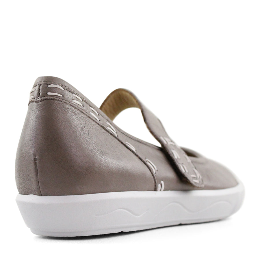 BACK VIEW OF GREY CASUAL SHOE WITH MARY JANE STYLE STRAP ACROSS THE TOP  AND WHITE STITCH DETAIL   