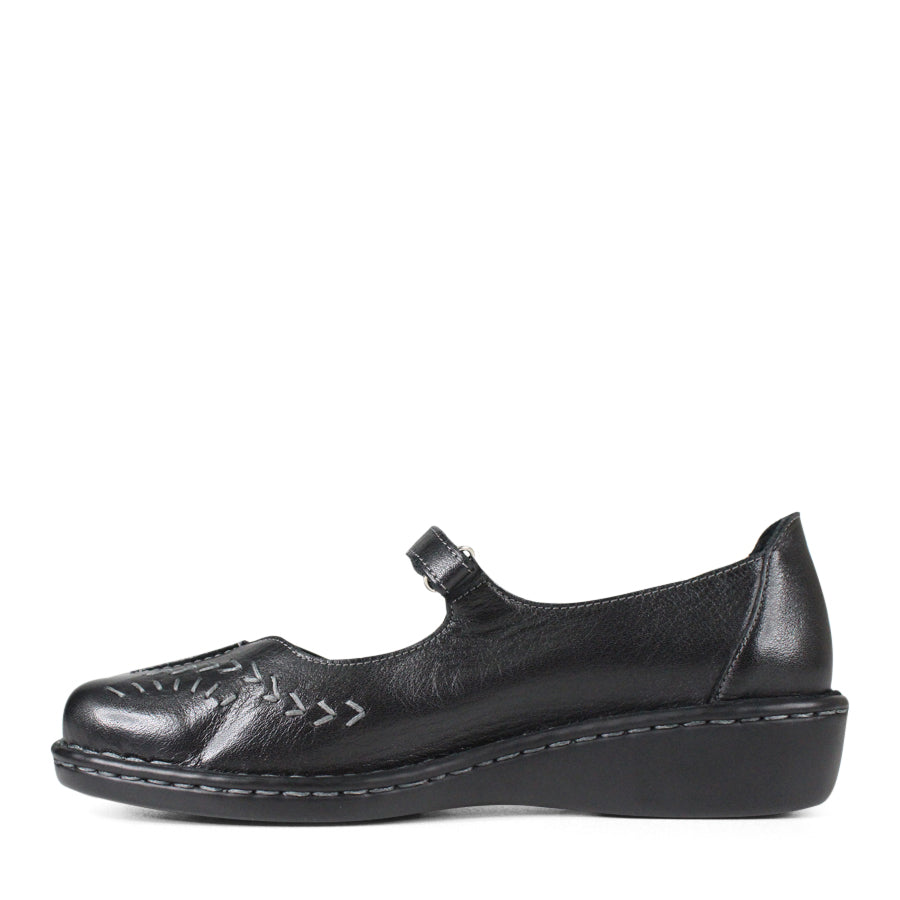 SIDE VIEW OF BLACK LEATHER CASUAL SHOE WITH VELCRO STRAP AND WHITE STITCHING DETAIL