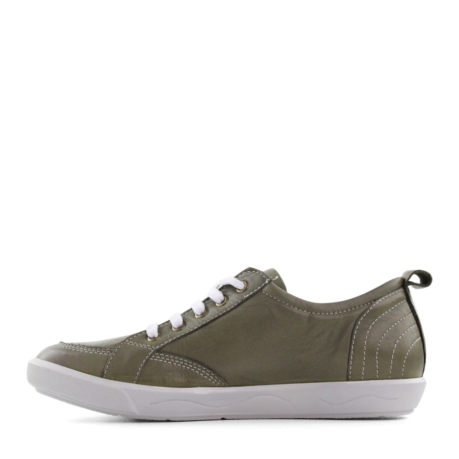 SIDE VIEW OF GREEN LACE UP SNEAKER WITH WHITE STITCHING AND SOLE 