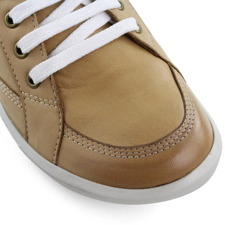 FRONT VIEW OF BEIGE LACE UP SNEAKER WITH LIGHT STITCHING AND SOLE 