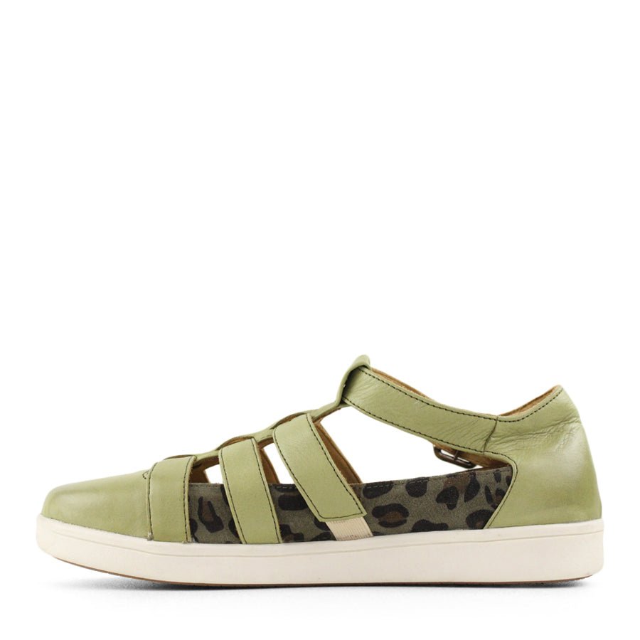 SIDE VIEW OF GREEN T BAR SANDAL WITH CUT OUT DETAILING, BUCKLE AND LEOPARD PRINT PANELS  