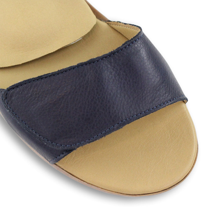 FRONT VIEW OF NAVY SANDAL WITH VELCRO STRAP AND SMALL HEEL 