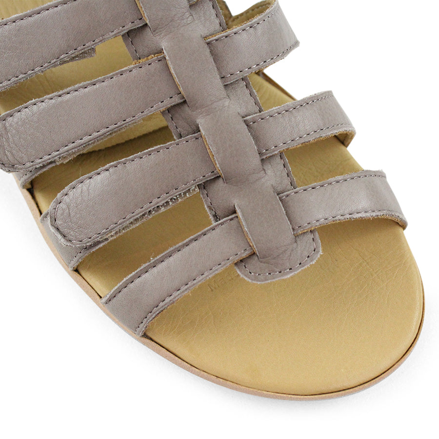 FRONT VIEW OF GREY T BAR SANDAL WITH VELCRO STRAP AND SMALL HEEL 
