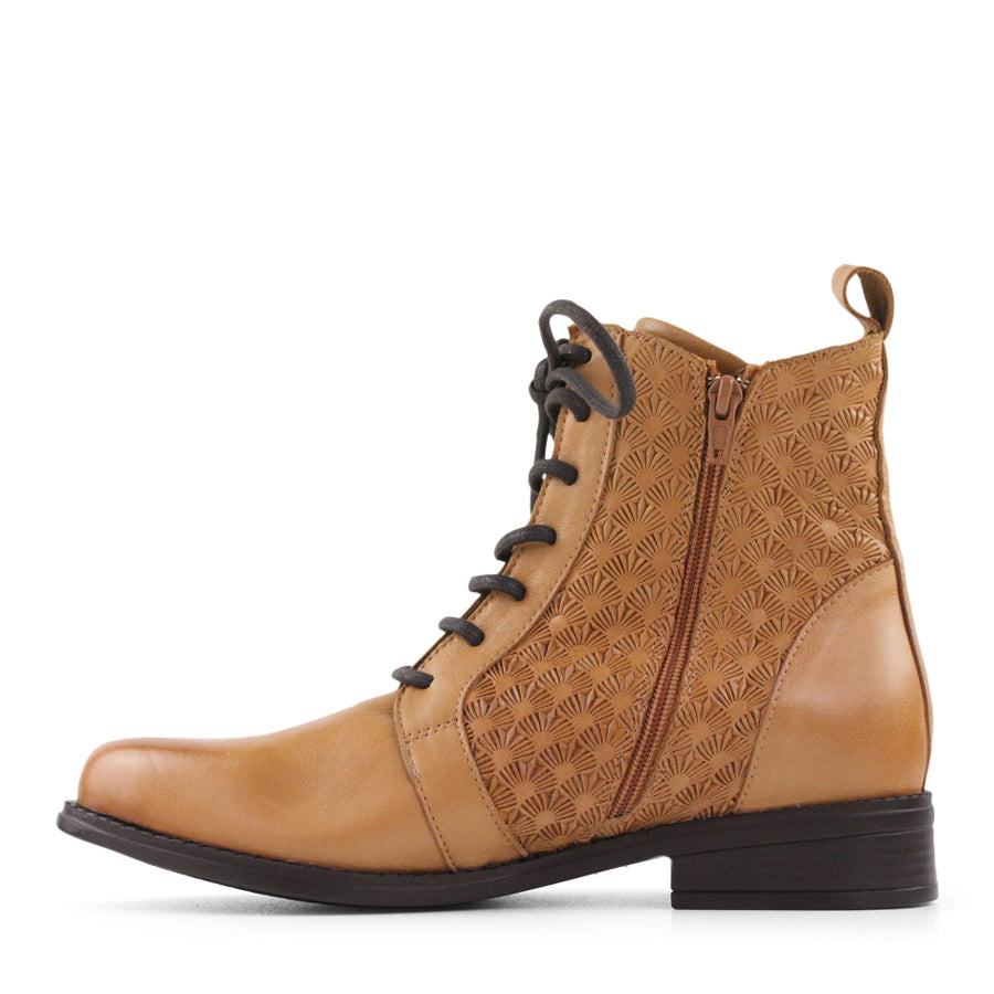 SIDE VIEW OF TAN ANKLE LACE UP BOOT WITH PATTERNED LEATHER DETAILS 