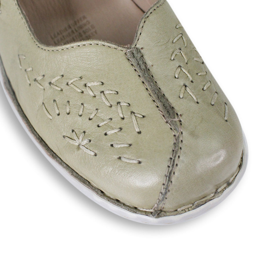 FRONT VIEW OF LIGHT GREEN LEATHER CASUAL SHOE WITH VELCRO STRAP AND WHITE STITCHING DETAIL