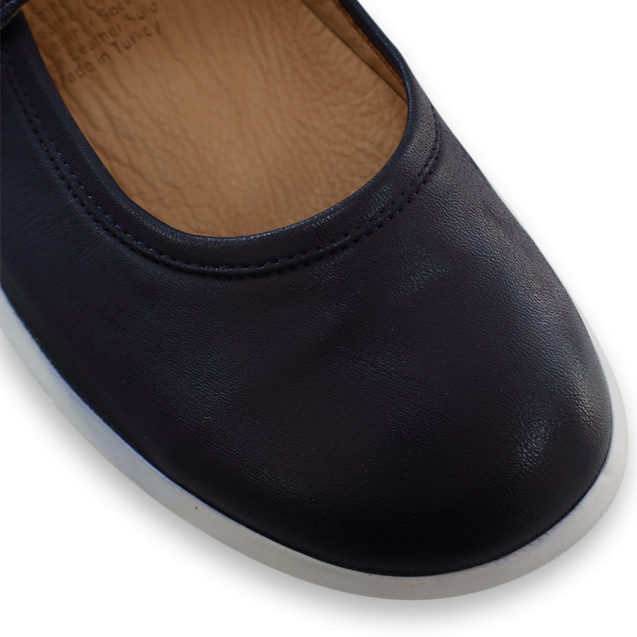 FRONT VIEW OF NAVY CASUAL SHOE WITH MARY JANE STYLE STRAP ACROSS THE TOP