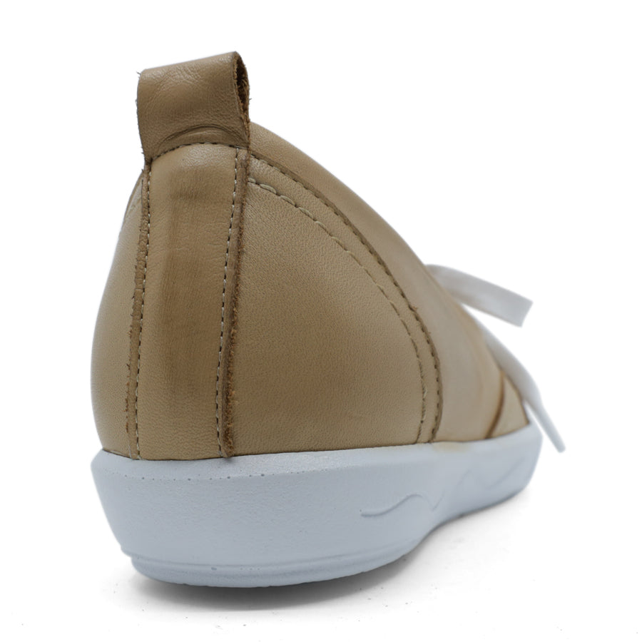 BACK VIEW OF BEIGE CASUAL SHOE WITH LACES AT THE FRONT AND WHITE SOLE 