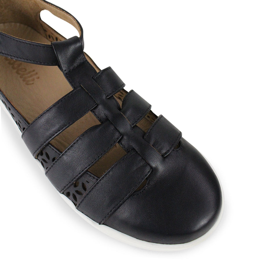 FRONT VIEW OF BLACK T BAR SANDAL WITH CUT OUT DETAILING AND BUCKLE 