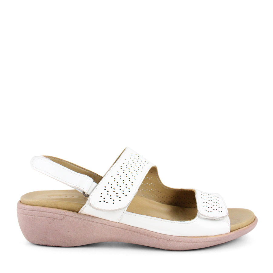SIDE VIEW OF WHITE Y BACK SANDAL WITH VELCRO ADJUSTABLE STRAPS AND PERFORATED DETAILING 
