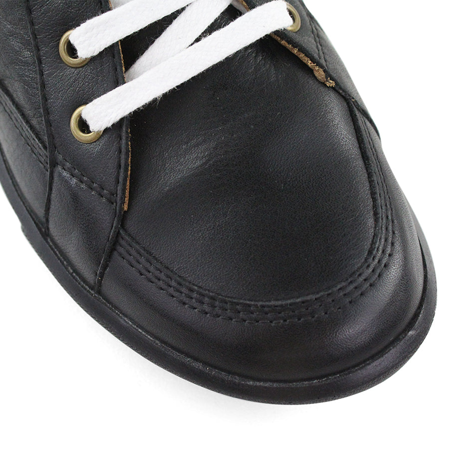 FRONT VIEW OF BLACK LACE UP SNEAKER WITH BLACK STITCHING AND SOLE 