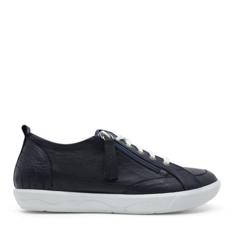  SIDE VIEW OF NAVY LACE UP SNEAKER WITH SIDE ZIP AND WHITE SOLE 
