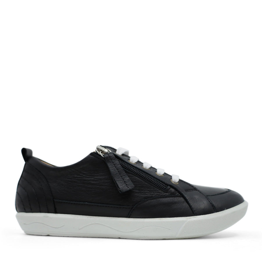SIDE VIEW OF BLACK LACE UP SNEAKER WITH SIDE ZIP AND WHITE SOLE 