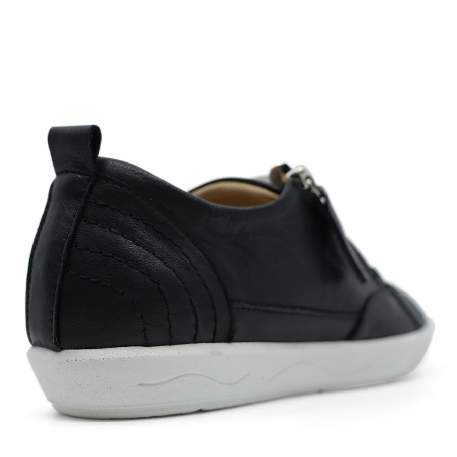 BACK VIEW OF BLACK LACE UP SNEAKER WITH SIDE ZIP AND WHITE SOLE 