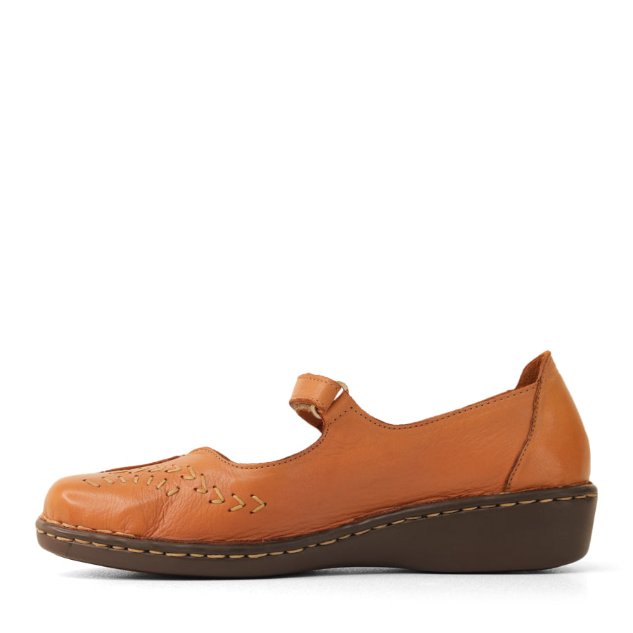 SIDE VIEW OF TAN LEATHER CASUAL SHOE WITH VELCRO STRAP AND WHITE STITCHING DETAIL