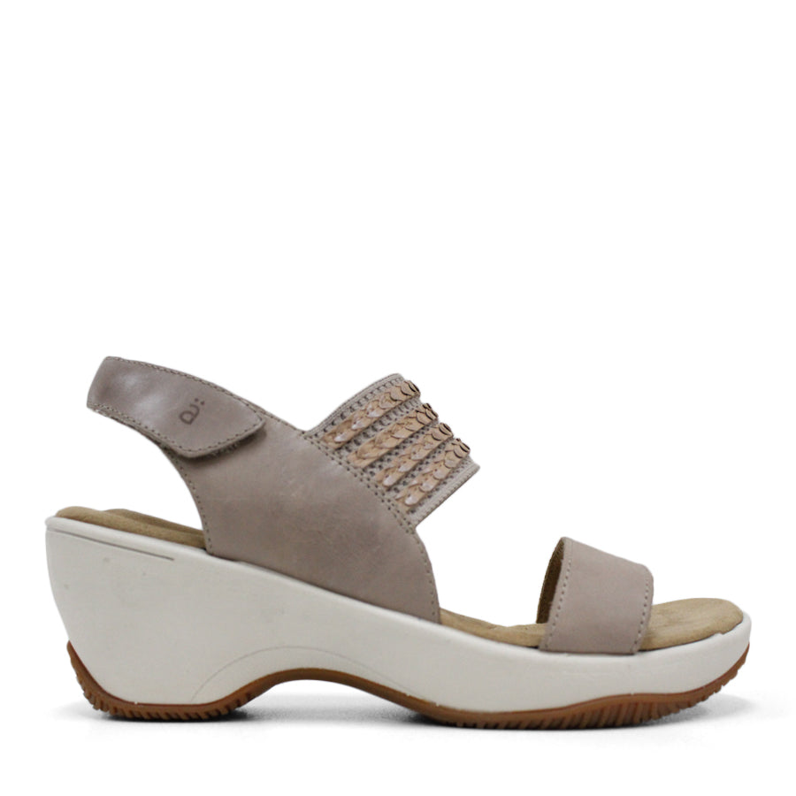 SIDE VIEW OF GREEN MID HEEL WITH Y BACK STRAP AND VELCRO ADJUSTABLE STRAP. WHITE SOLE 