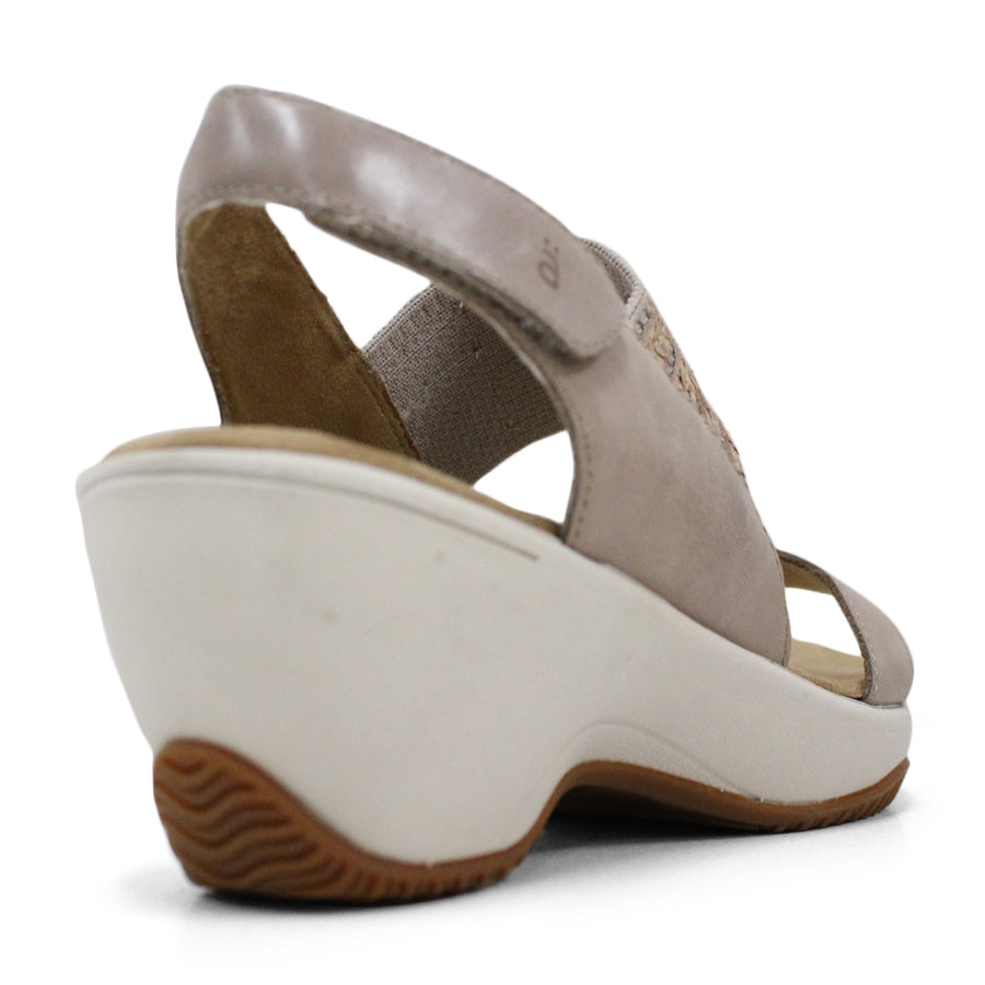 BACK VIEW OF TAUPE MID HEEL WITH Y BACK STRAP AND VELCRO ADJUSTABLE STRAP. WHITE SOLE 