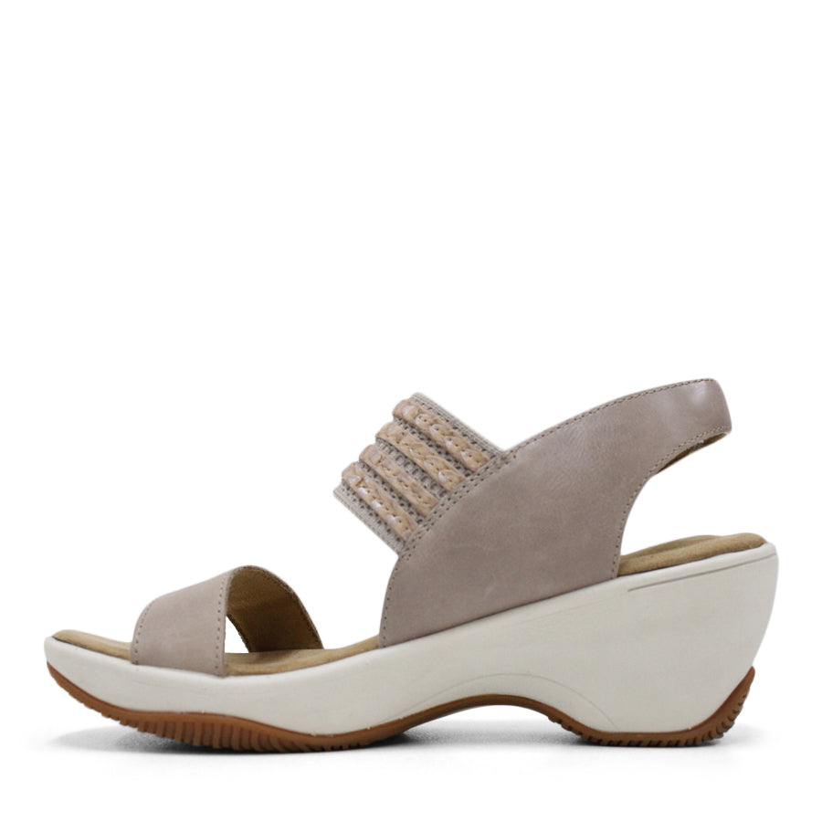 SIDE VIEW OF TAUPE MID HEEL WITH Y BACK STRAP AND VELCRO ADJUSTABLE STRAP. WHITE SOLE 