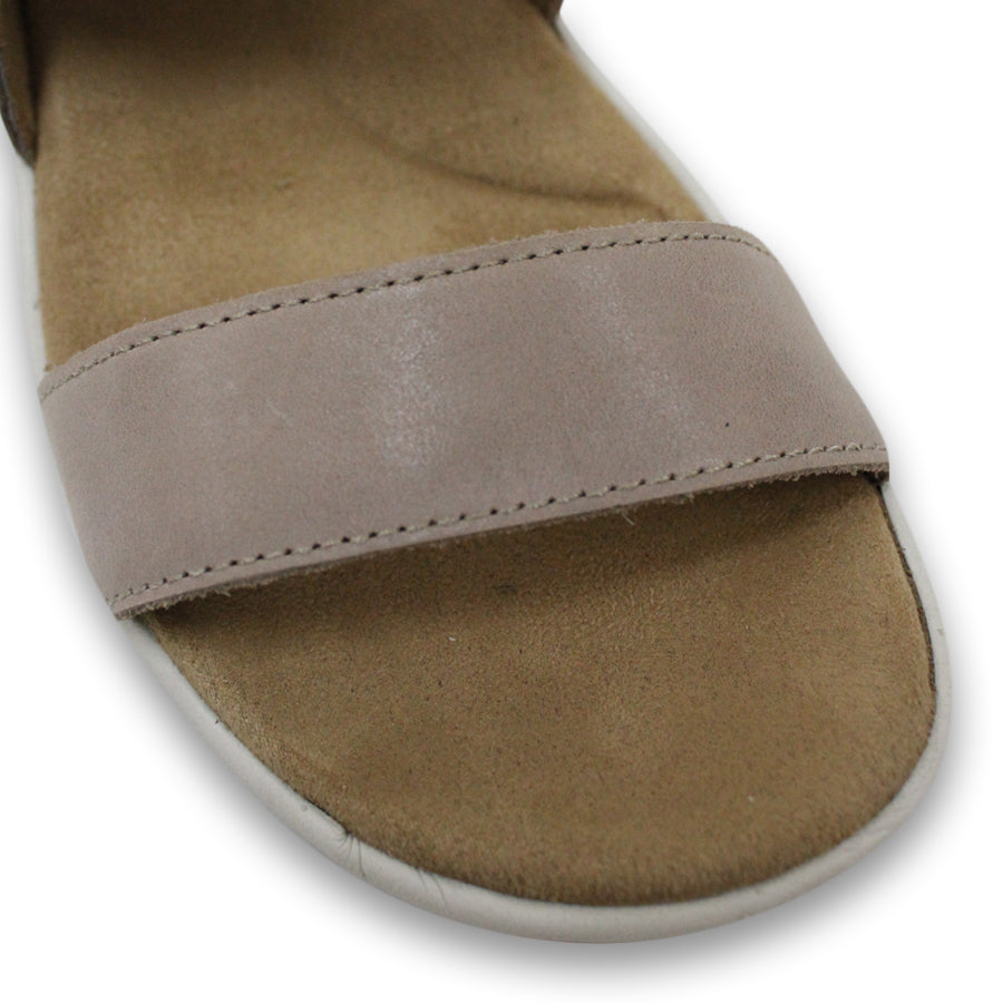 FRONT VIEW OF TAUPE MID HEEL WITH Y BACK STRAP AND VELCRO ADJUSTABLE STRAP. WHITE SOLE 