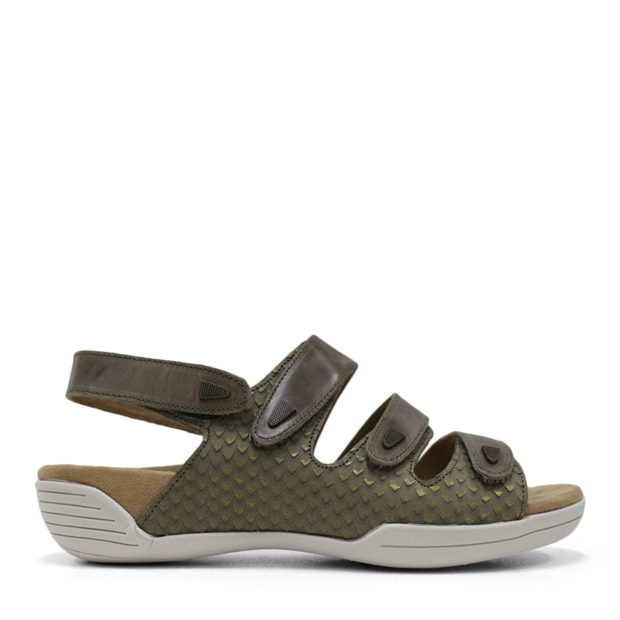   SIDE VIEW OF GREEN FLAT SANDAL WITH 3 STRAPS OVER THE FOOT AND ONE AROUND THE HEEL. TRIANGLE PATTERN DETAIL. 