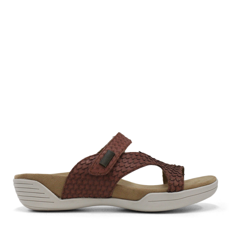 SIDE VIEW OF TAUPE FLAT SANDAL WITH TRANGLE TEXTURED STRAPS, OPEN TOE AND WHITE SOLE 