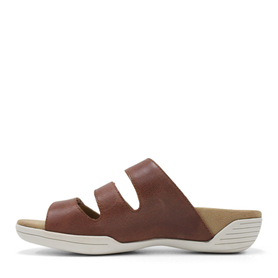 SIDE VIEW OF BROWN FLAT SANDAL WITH TRANGLE TEXTURED SIDE PANELS, OPEN TOE, OPEN BACK, WHITE SOLE AND THREE STRAPS ACROSS THE FRONT 