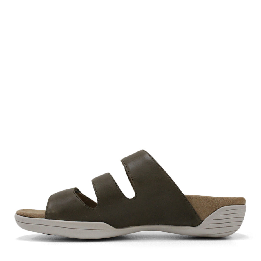 SIDE VIEW OF GREEN FLAT SANDAL WITH TRANGLE TEXTURED SIDE PANELS, OPEN TOE, OPEN BACK, WHITE SOLE AND THREE STRAPS ACROSS THE FRONT 