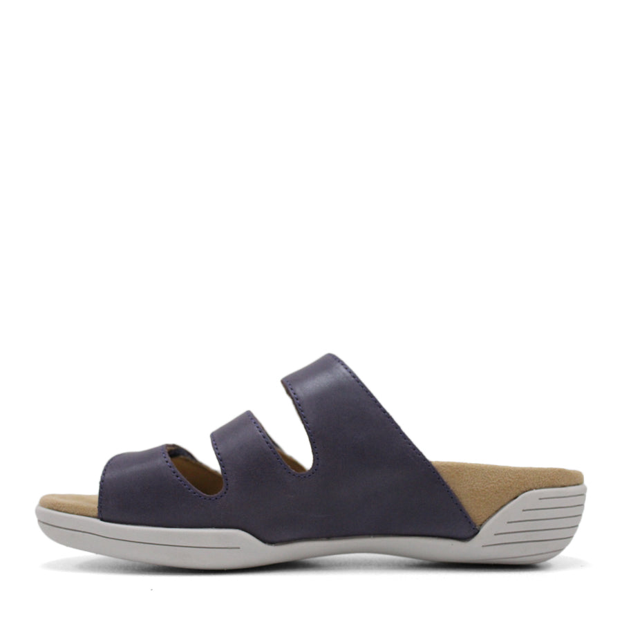 SIDE VIEW OF BLUE FLAT SANDAL WITH TRANGLE TEXTURED SIDE PANELS, OPEN TOE, OPEN BACK, WHITE SOLE AND THREE STRAPS ACROSS THE FRONT 