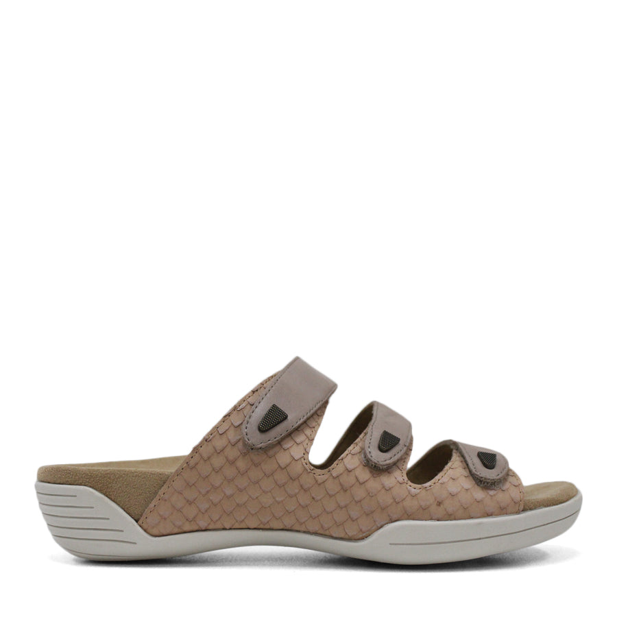 SIDE VIEW OF RED FLAT SANDAL WITH TRANGLE TEXTURED SIDE PANELS, OPEN TOE, OPEN BACK, WHITE SOLE AND THREE STRAPS ACROSS THE FRONT 