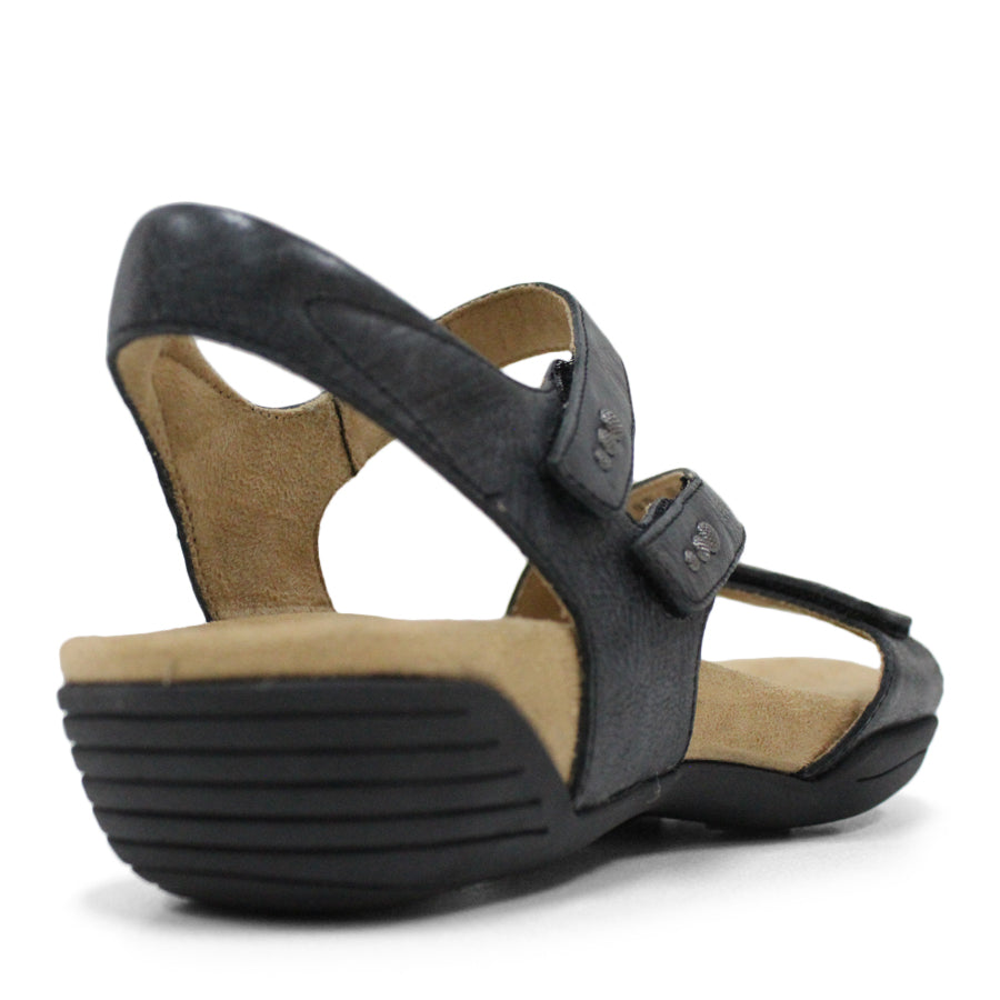 BACK VIEW OF BLACK FLAT SANDAL WITH OPEN TOE, OPEN BACK, WHITE SOLE AND THREE STRAPS ACROSS THE FRONT 