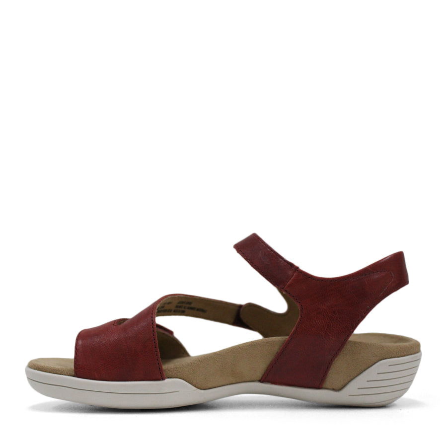SIDE VIEW OF RED FLAT SANDAL WITH OPEN TOE, OPEN BACK, WHITE SOLE AND THREE STRAPS ACROSS THE FRONT 