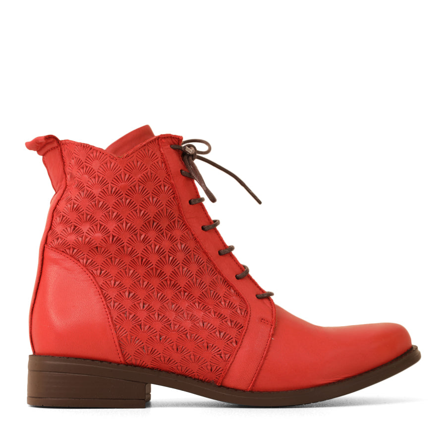 SIDE VIEW OF TAN ANKLE LACE UP BOOT WITH PATTERNED LEATHER DETAILS 