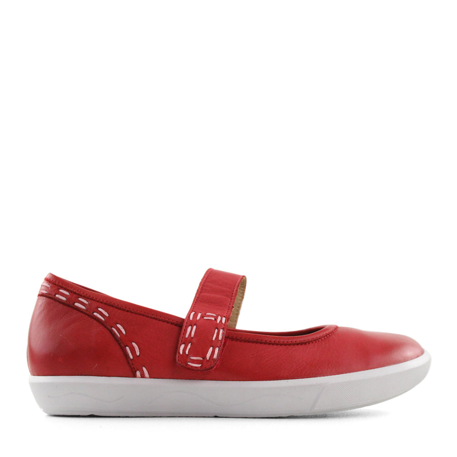 SIDE VIEW OF RED CASUAL SHOE WITH MARY JANE STYLE STRAP ACROSS THE TOP  AND WHITE STITCH DETAIL   