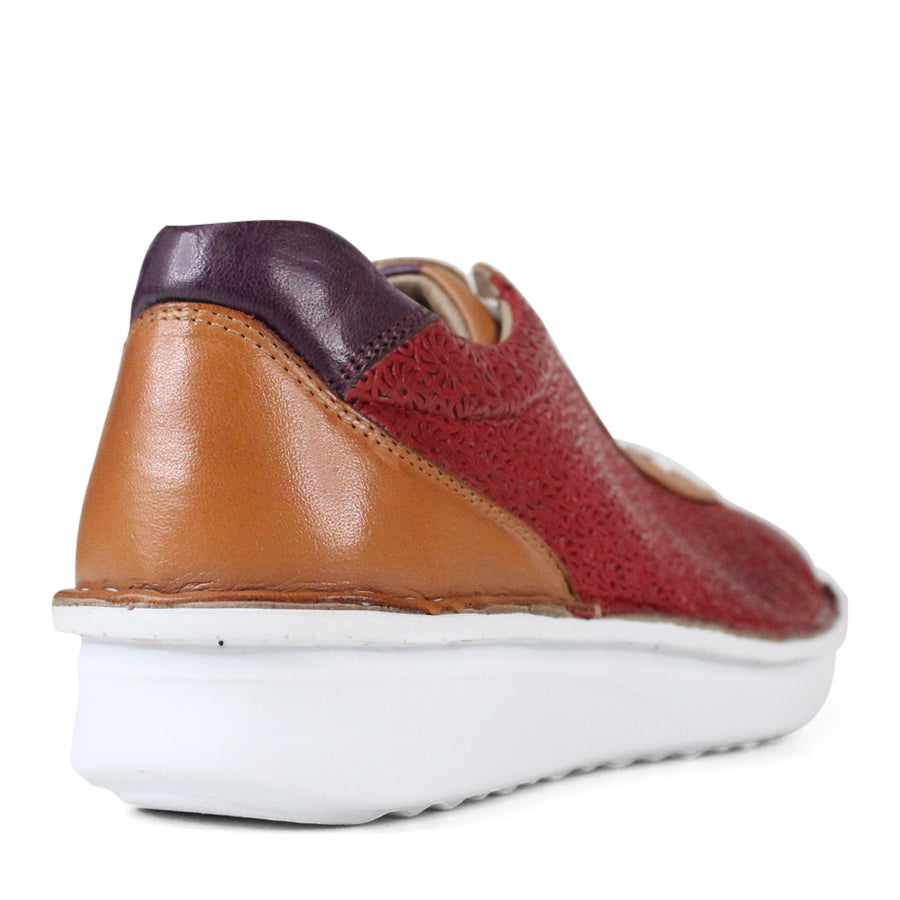 BACK VIEW OF PATTERNED RED LEATHER LACE UP SNEAKER WITH TAN PANELS AND WHITE SOLE 