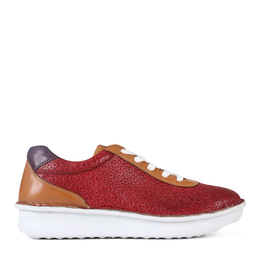 SIDE VIEW OF PATTERNED RED LEATHER LACE UP SNEAKER WITH TAN PANELS AND WHITE SOLE 