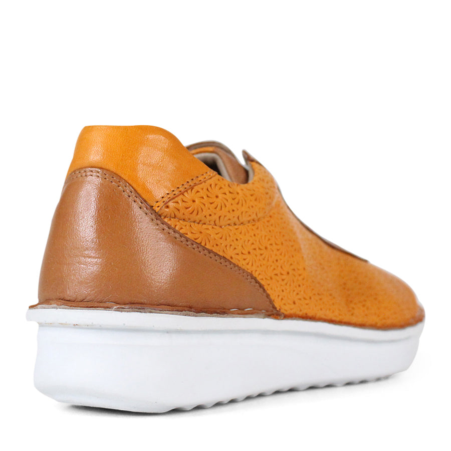 BACK VIEW OF PATTERNED YELLOW LEATHER LACE UP SNEAKER WITH TAN PANELS AND WHITE SOLE 