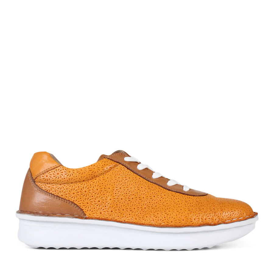 SIDE VIEW OF PATTERNED YELLOW LEATHER LACE UP SNEAKER WITH TAN PANELS AND WHITE SOLE 