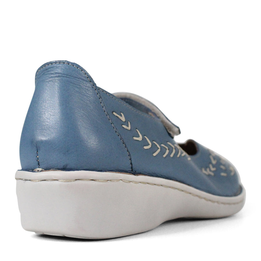 BACK VIEW OF BLUE LEATHER CASUAL SHOE WITH VELCRO STRAP AND WHITE STITCHING DETAIL