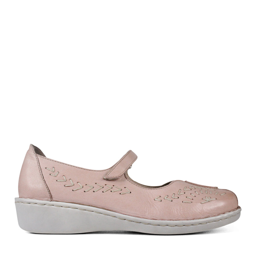 SIDE VIEW OF PINK LEATHER CASUAL SHOE WITH VELCRO STRAP AND WHITE STITCHING DETAIL