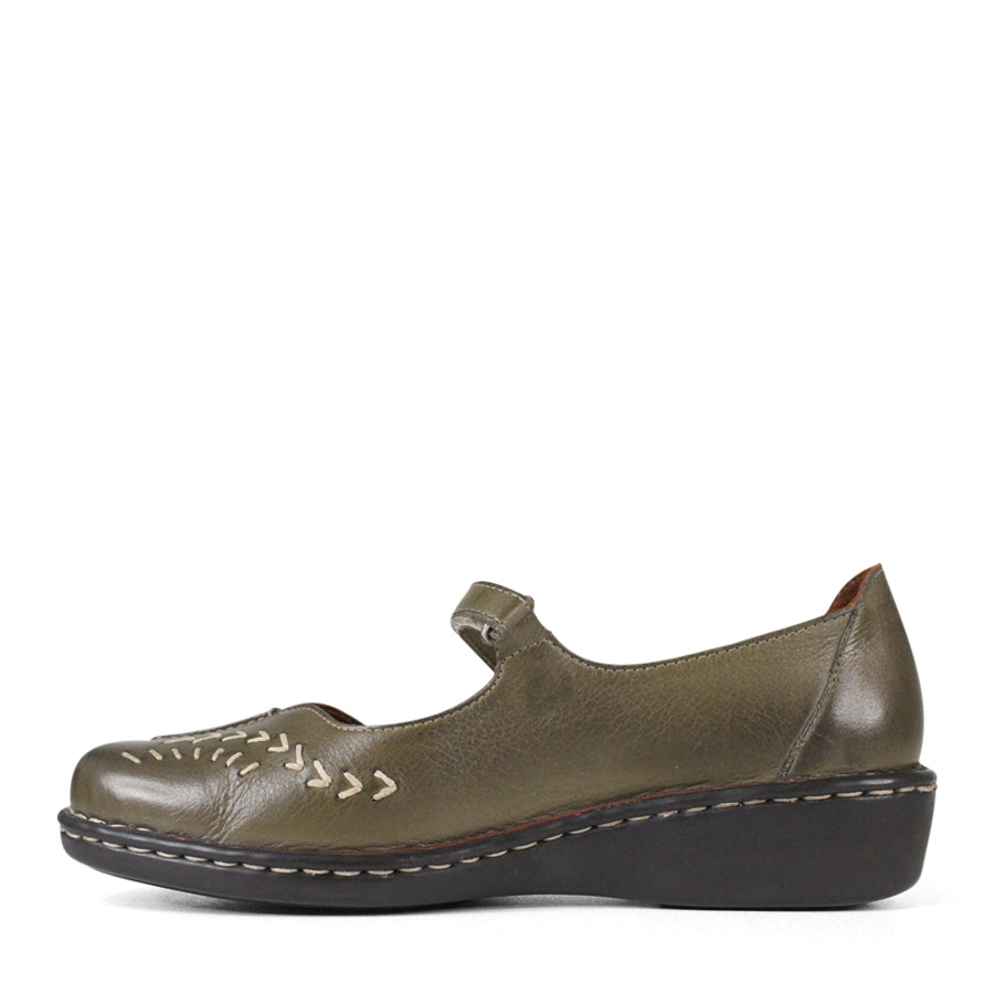 SIDE VIEW OF GREEN LEATHER CASUAL SHOE WITH VELCRO STRAP AND WHITE STITCHING DETAIL