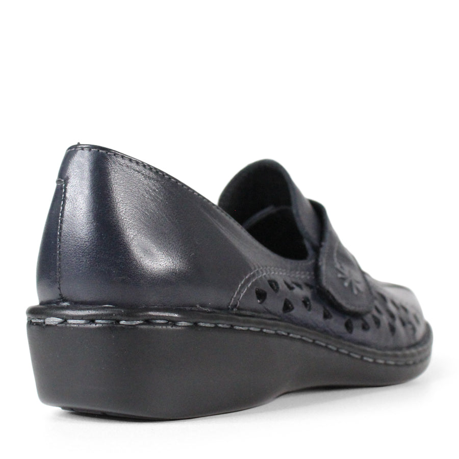 BACK VIEW OF NAVY LEATHER CASUAL SHOE WITH VELCRO STRAP AND TRIANGLE SHAPED CUTOUTS ON THE SIDE