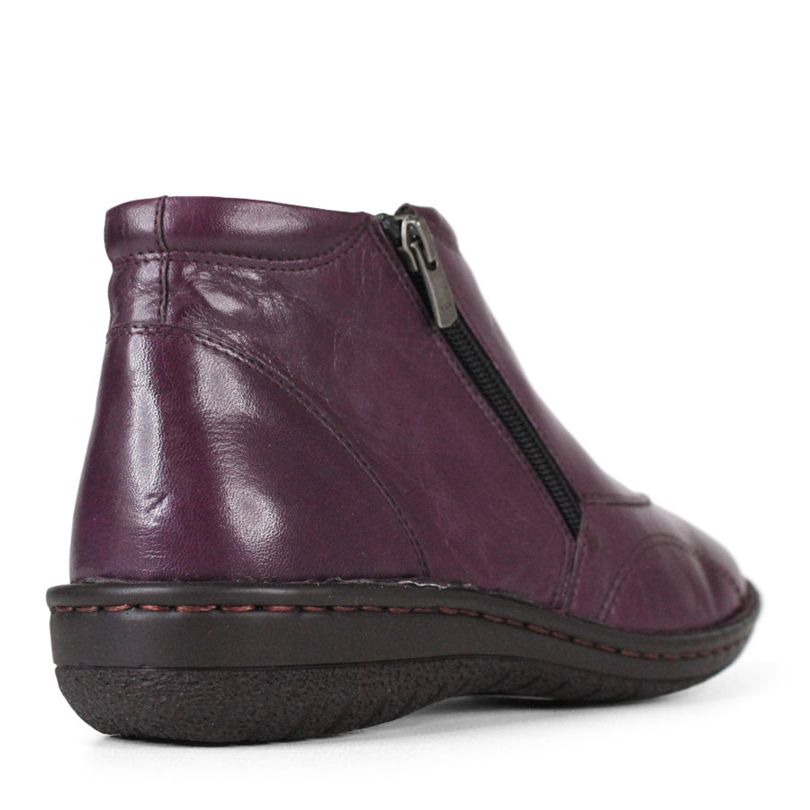 BACK VIEW OF PURPLE LEATHER ANKLE BOOT WITH BLACK SIDE ZIPPER AND BLACK SOLE