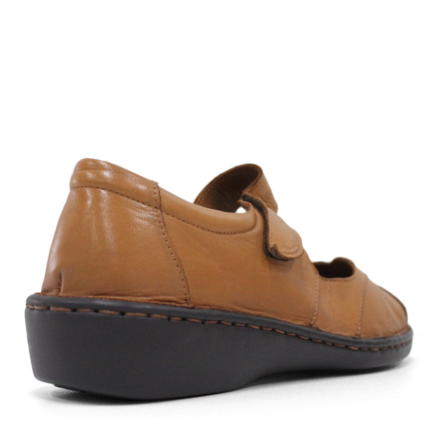 BACK VIEW OF TAN LEATHER FLAT CASUAL SHOW WITH VELCRO CLOSURE