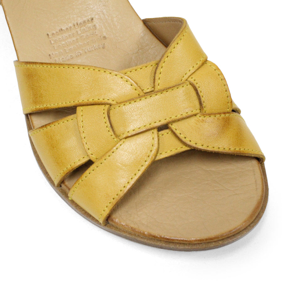FRONT VIEW OF YELLOW LEATHER SANDAL WITH INTERWOVEN FRONT STRAP