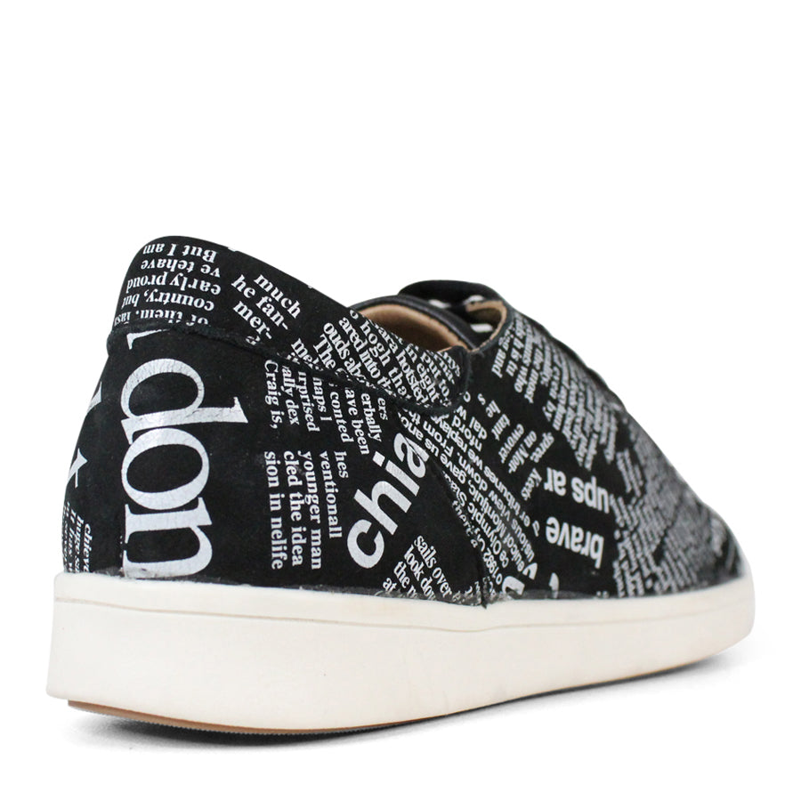 BACK VIEW OF BLACK NEWSPAPER PRINT LACE UP SNEAKER WITH WHITE SOLE 