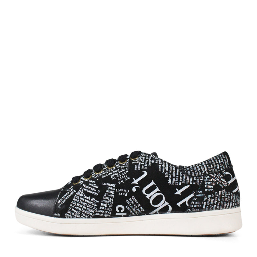  SIDE VIEW OF BLACK NEWSPAPER PRINT LACE UP SNEAKER WITH WHITE SOLE 